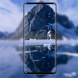 a smartphone with a mountain in the background