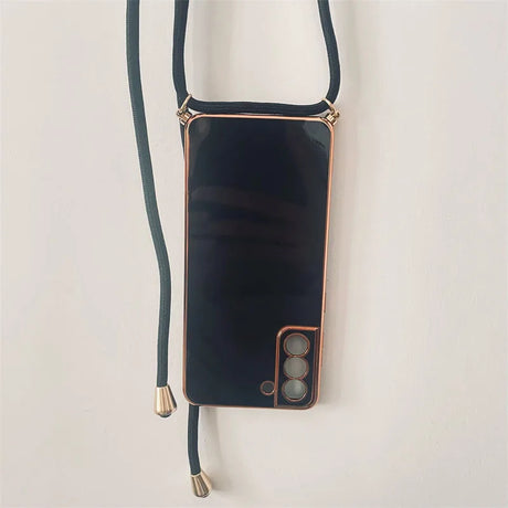 Smartphone with a black case and crossbody strap attached.