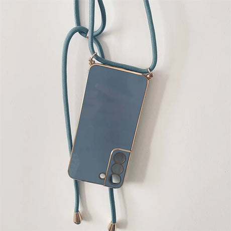 Smartphone with a blue-gray case and attached neck strap.