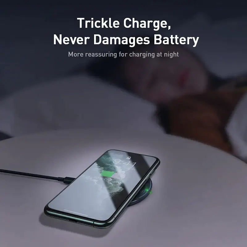 a smartphone with a charging cable attached to it