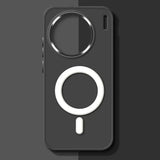 Smartphone case with a circular magnetic attachment for wireless charging.