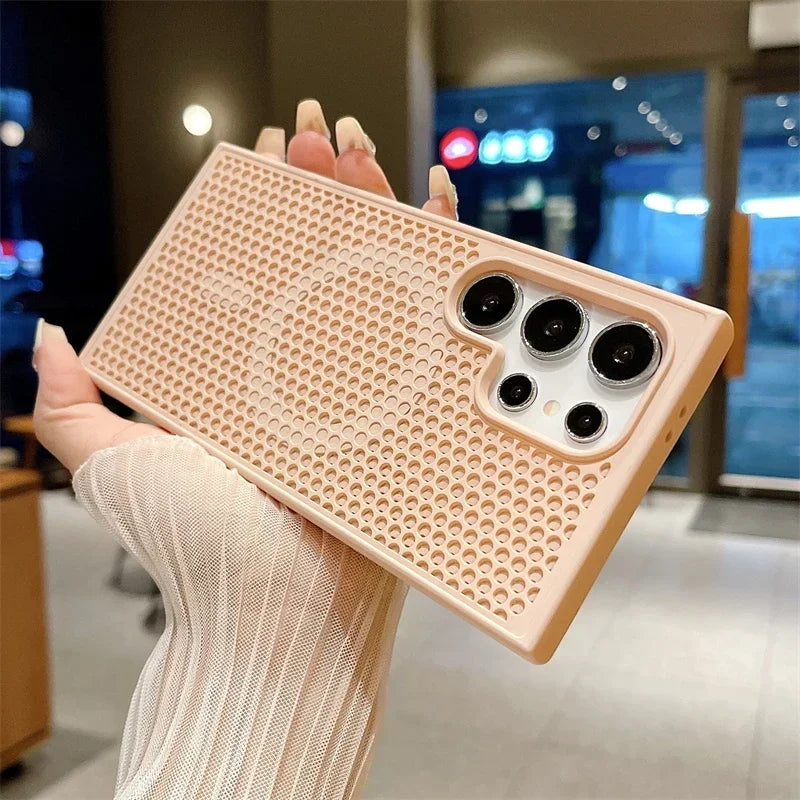 Smartphone case with a honeycomb pattern and multiple camera cutouts.