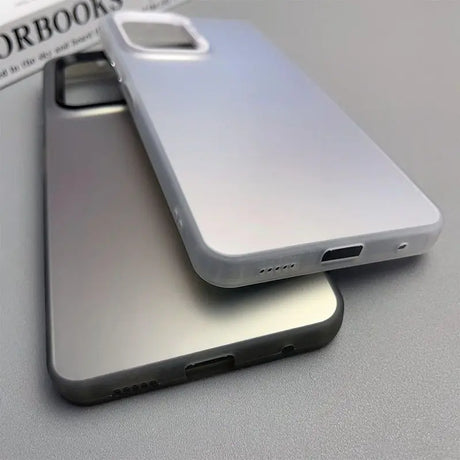 Smartphone case with a sleek, metallic finish and visible charging port.