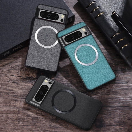 Smartphone cases with circular design elements and camera cutouts in different colors.