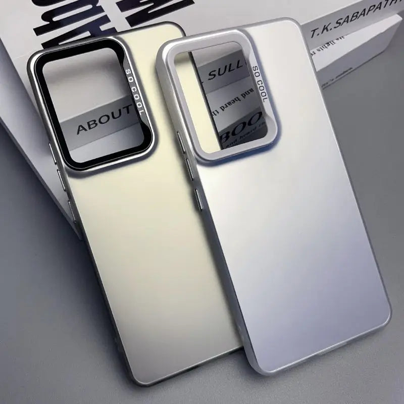 Smartphone cases with cutouts for the camera and text visible through openings.