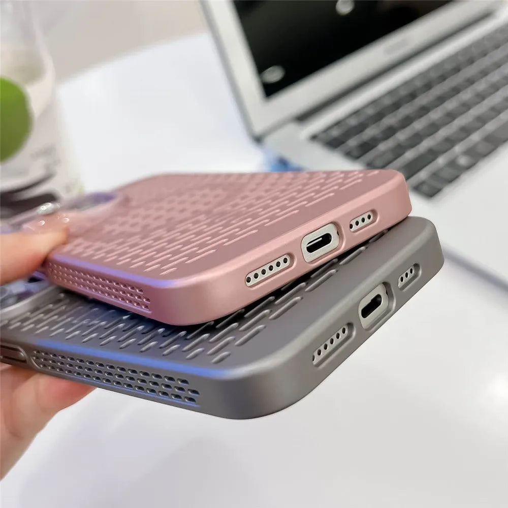 Smartphone cases in pink and gray colors with visible charging ports.