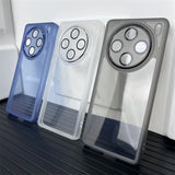 Smartphone cases with prominent circular camera cutouts in blue, white, and gray colors.