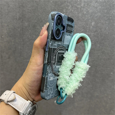 Smartphone in a circuit board case with a fuzzy strap.