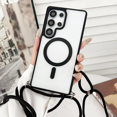 Smartphone in a clear case with a black MagSafe ring and lanyard.