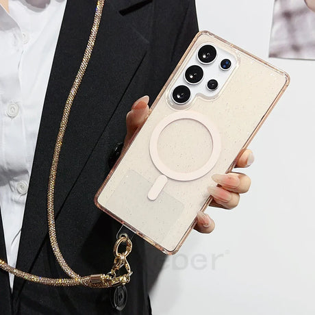 Smartphone in a clear case with a magnetic ring and a sparkly chain strap.