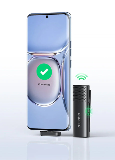 Smartphone connected to a wireless microphone.