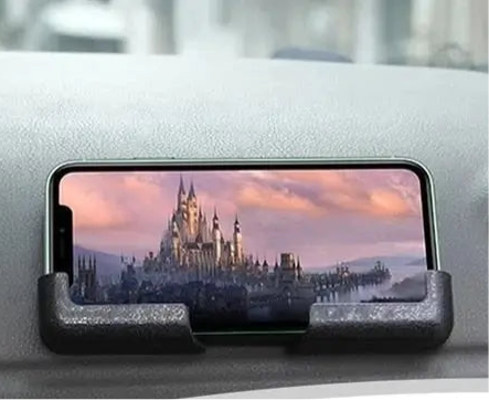 Smartphone displaying a fantasy castle against a sunset sky.