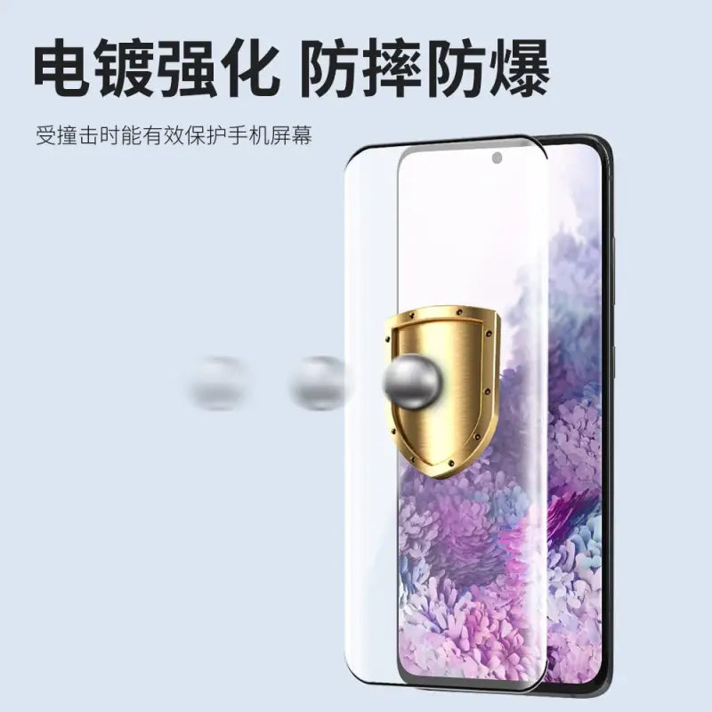a smartphone with a gold ring on it