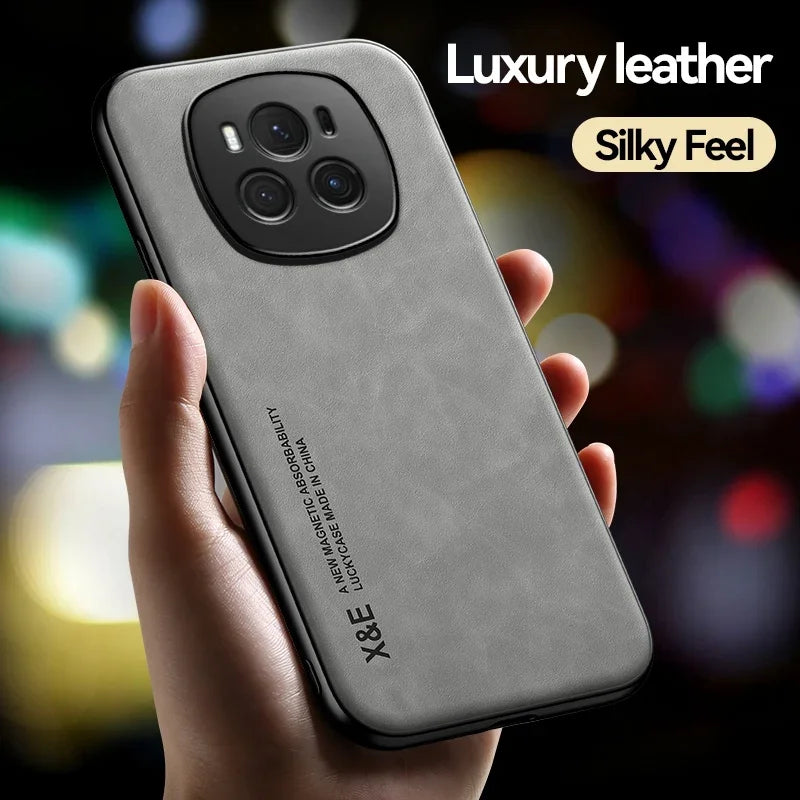 Smartphone with a gray leather case featuring a prominent triple-camera setup.