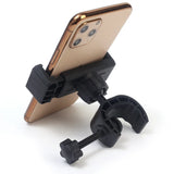 Smartphone holder with a clamp mechanism for attaching to surfaces.