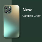 Smartphone with a metallic green gradient finish and multiple camera lenses.