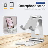 the smartphone stand is on a wooden table