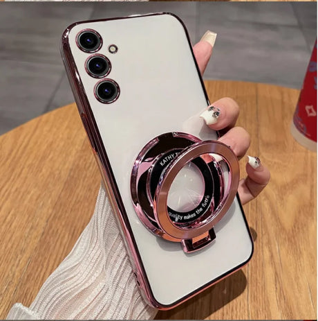 Smartphone with three cameras and a circular ring attachment on its back.