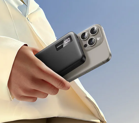 Smartphone with a triple-lens camera and an attached battery pack.