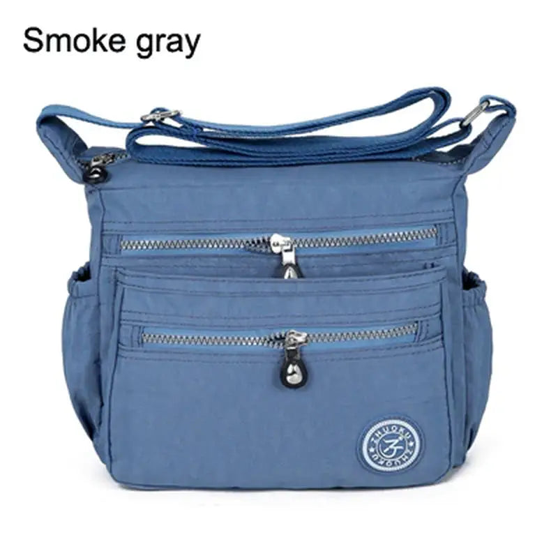 a blue bag with a zipper on the front