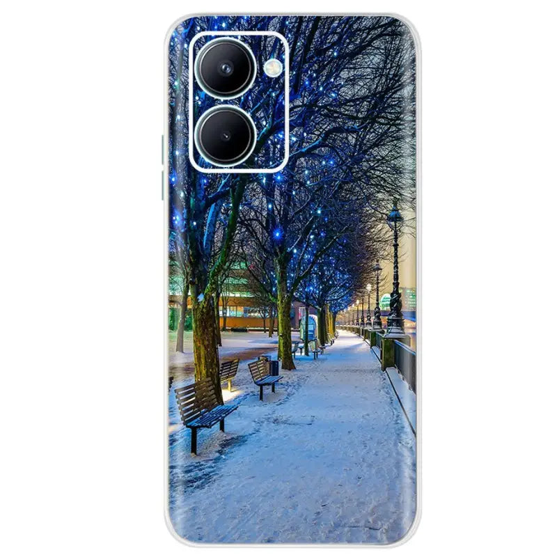 a snowy night in the city with a bench and trees phone case