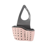 a pink and black plastic basket with holes