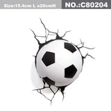 a soccer ball is breaking through the wall