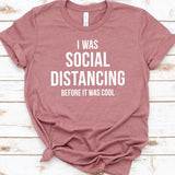 a t shirt that says i was social distaning before it was cool