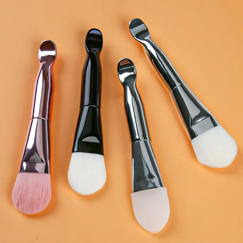 three brushes on a orange background