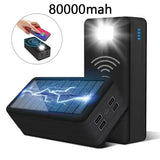 a solar power bank with a hand holding a phone