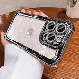 Sparkly clear iPhone case with chrome accents and camera protection.