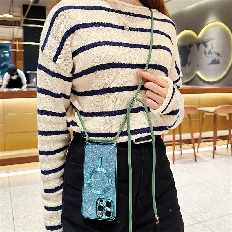 Sparkly green phone case with crossbody strap.