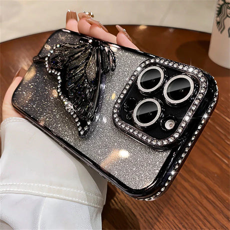 Sparkly phone case with butterfly.