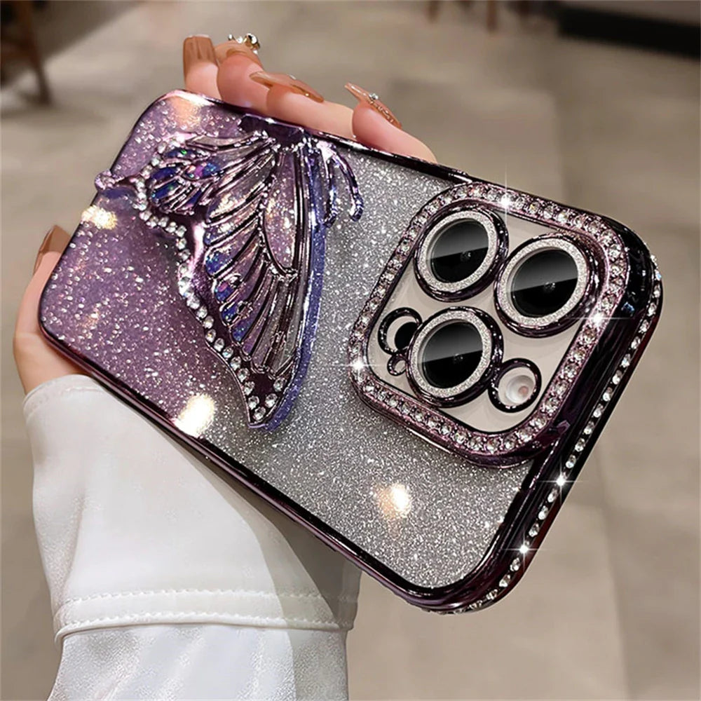 Sparkly phone case with butterfly and rhinestone camera surround.