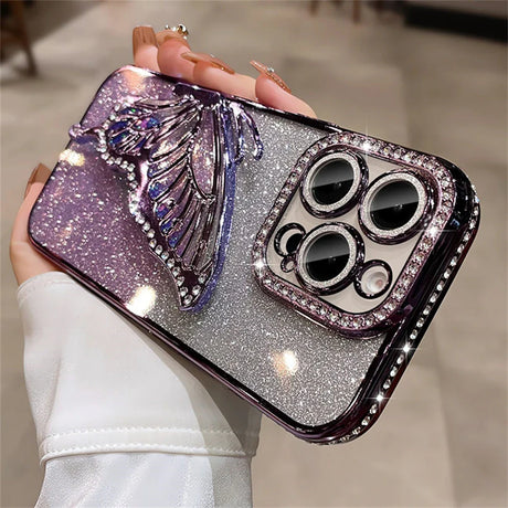 Sparkly phone case with butterfly and rhinestone camera surround.