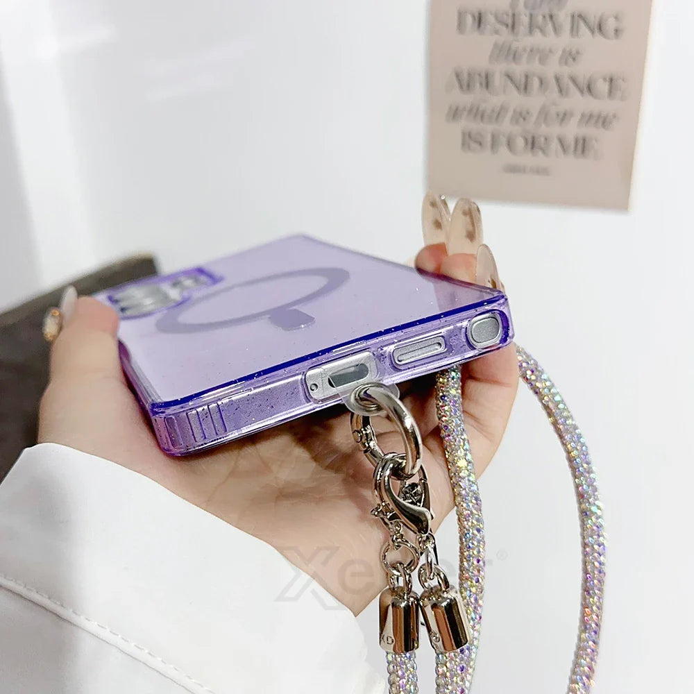 Sparkly purple phone case with rhinestone strap.