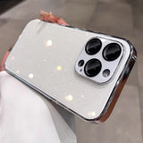 Sparkly white phone case with chrome edges and camera protection.