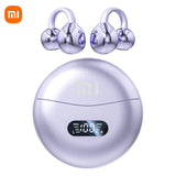 Spherical metallic charging case with a digital display, accompanied by two pairs of wireless earbuds.