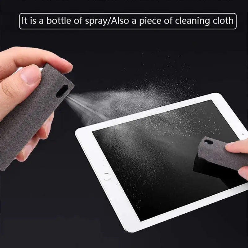 a hand holding a tablet with a spray on it