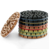 a stack of four different colored bracelets