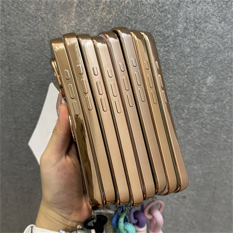 Stack of shiny gold phone cases.