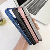 Stack of smartphone cases in different colors including blue, black, pink, and gray.