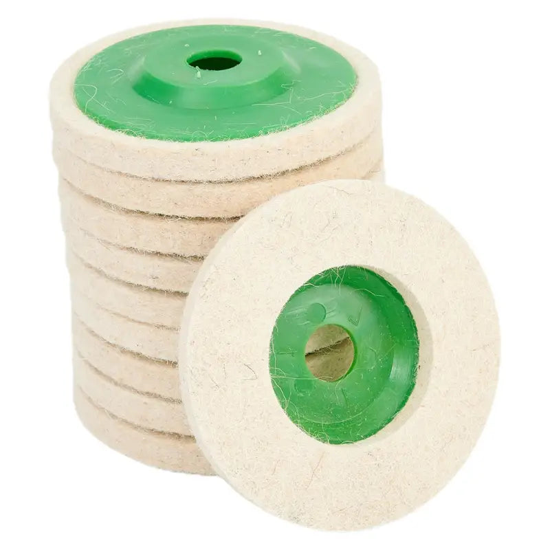 a stack of white and green foam wheels
