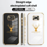 a gold deer phone case with a black background and a white background