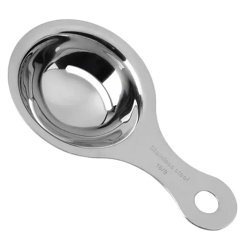 a stainless measuring spoon with a handle