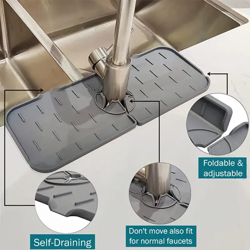 a stainless steel sink with a drainer and drainer