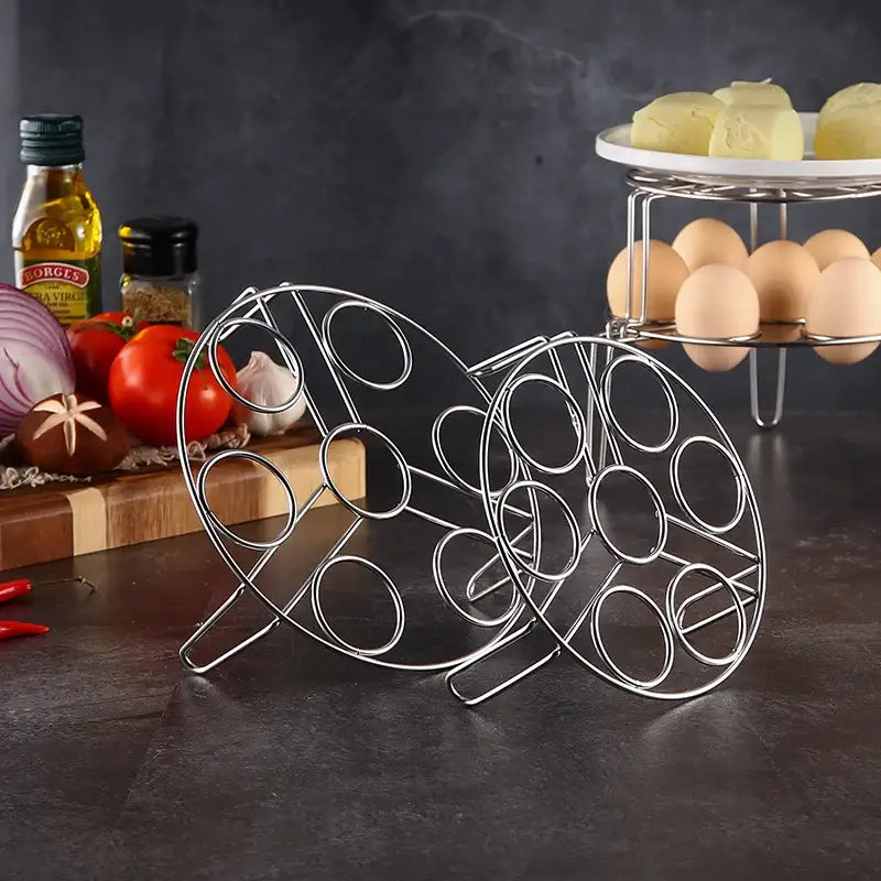 a stainless wire rack with eggs and vegetables