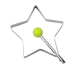 a star shaped cookie cutter with a tennis ball