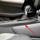 the interior of a car with a car door open