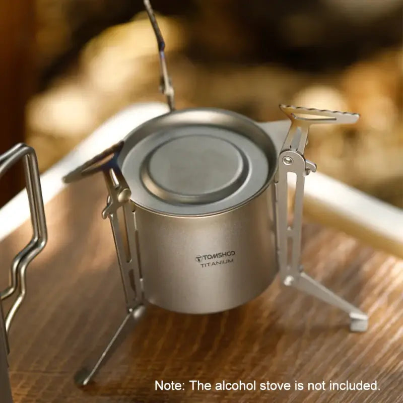 a stove with a pot on top of it